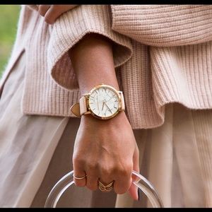 Peach/pink marble Christian Paul watch.